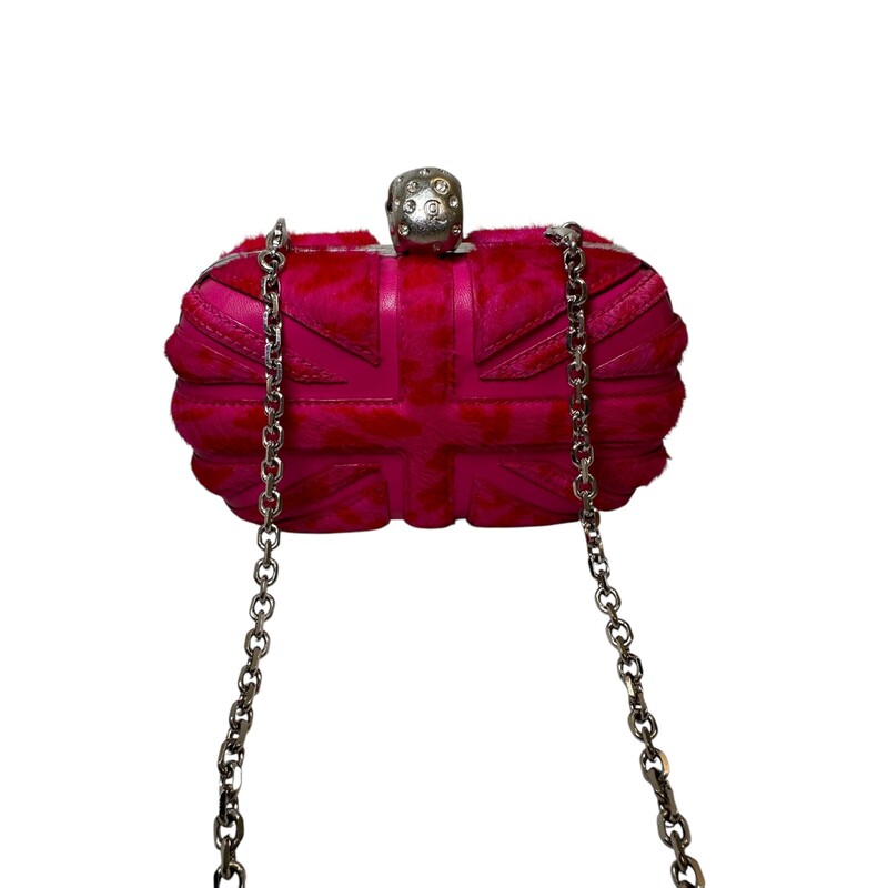 Alexander Mcqueen Union Jack Skull Pink Clutches<br />
<br />
Style Code: 260111 000926<br />
<br />
Dimensions: 6L x 4H inches<br />
<br />
In very good condition. Some scratching of the hardware.<br />
<br />
Does not come with the original dust bag or box.