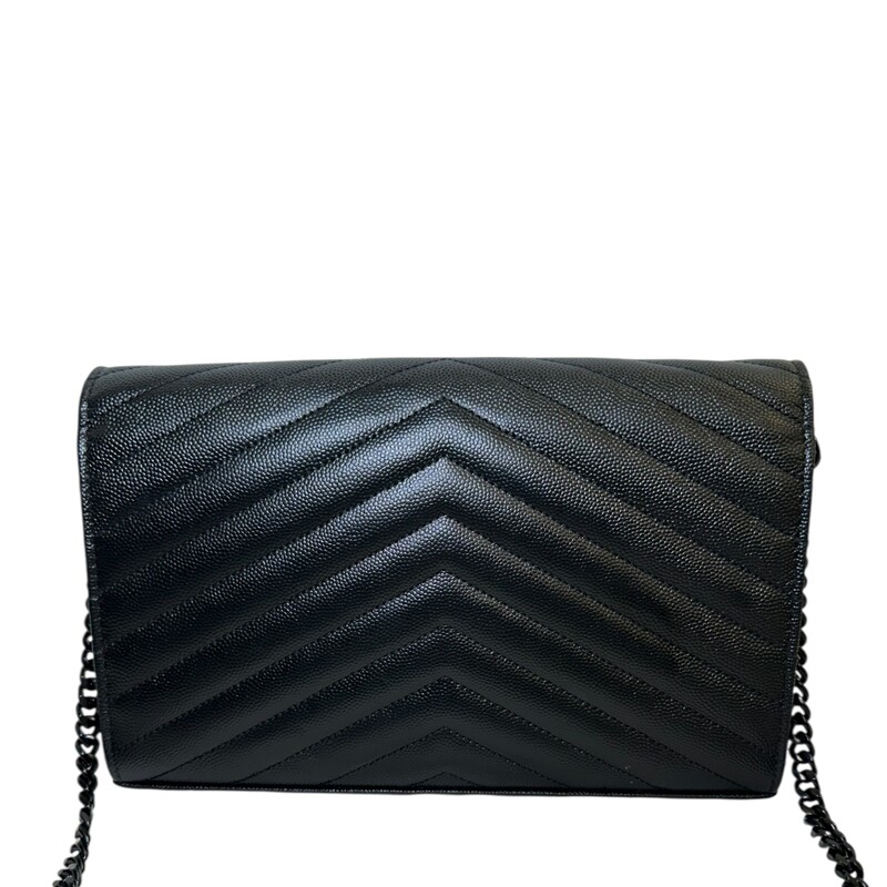 Saint Laurent Cassandre Black Woc<br />
<br />
Serial Code:GUE377828.0121<br />
<br />
Dimensions:8.5 L x 5.5 H inches<br />
<br />
In very good condition. Light scratching on the hardware. Scratching on inside.<br />
<br />
Does not come with the original dust bag or box