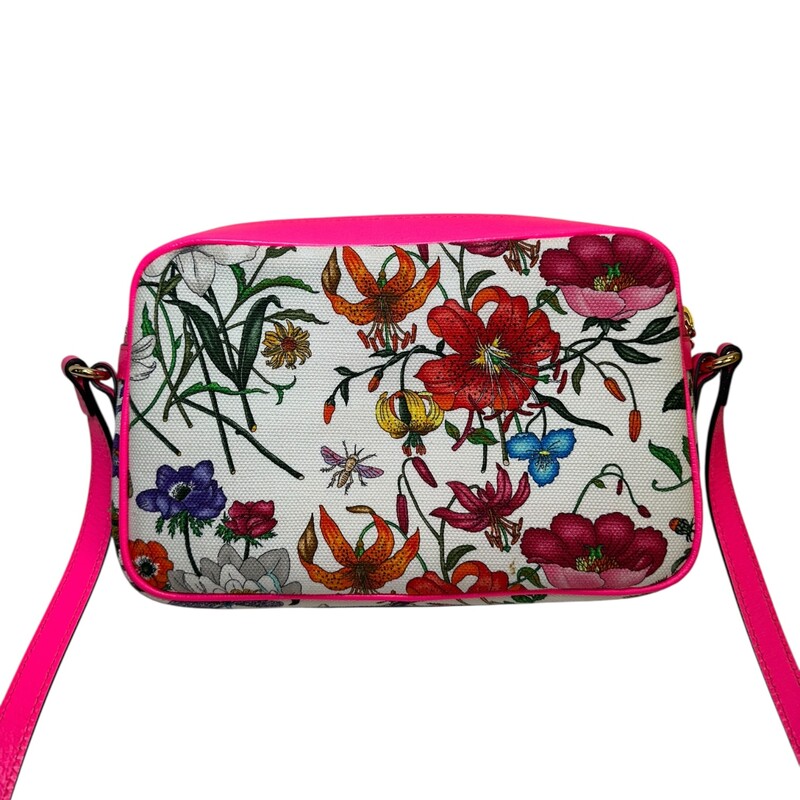 Gucci Flora Canvas Bag Pink trim<br />
<br />
Style Code:550147 493492<br />
<br />
Dimensions:9L x 6 H inches<br />
<br />
In very good condition. Some minor scratching of the hardware and some interior marks<br />
<br />
Does not come with the orignal dust bag or box..