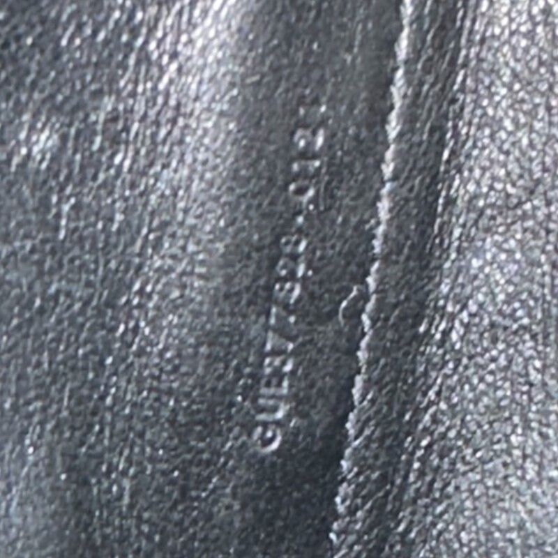 Saint Laurent Cassandre Black Woc<br />
<br />
Serial Code:GUE377828.0121<br />
<br />
Dimensions:8.5 L x 5.5 H inches<br />
<br />
In very good condition. Light scratching on the hardware. Scratching on inside.<br />
<br />
Does not come with the original dust bag or box