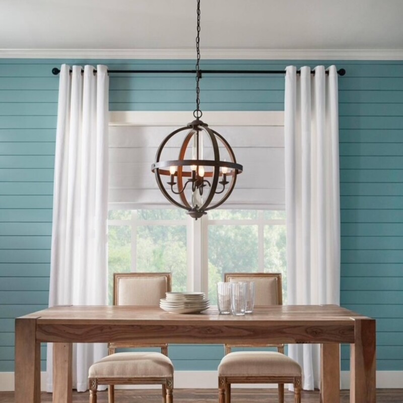 Artisan Elm Wood Iron Orb Chandelier<br />
Gray Brown Size: 20 x 25H<br />
Retails: $229+<br />
This 4-light pendant makes a statement in a variety of interiors. A classically designed frame features a Artisan Iron finish with elm wood accents. Can be hung as a single fixture - or in groupings of 2 or more - to complement coastal, rustic and reclaimed design styles.