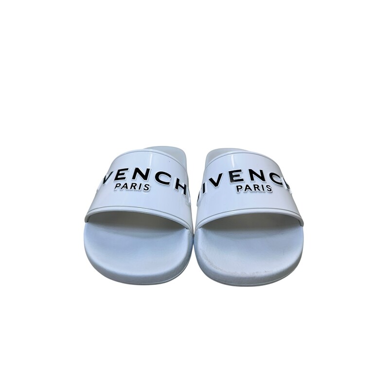 Givenchy Logo Slides<br />
<br />
Size: 37<br />
<br />
Style Number: ES 0271<br />
<br />
In very good condition. Some marks on the bottom of the shoes.<br />
<br />
Does not come with the original dust bag or box.