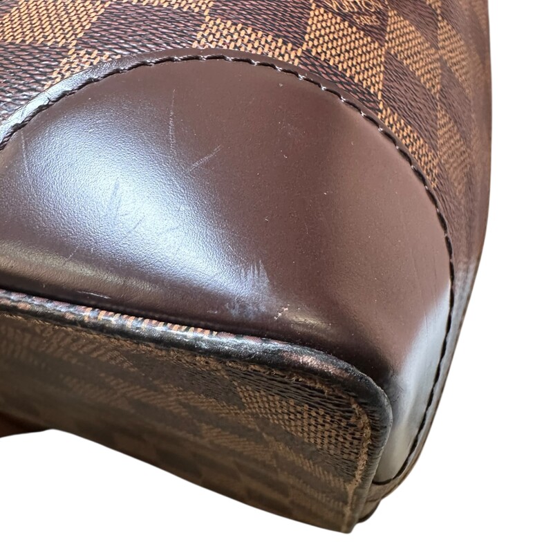 Louis Vuitton Hampstead Damier Ebene MM<br />
<br />
Date Code: Faded Entrupy Certficate Provided<br />
<br />
Dimensions:14 L X 11 H inches<br />
<br />
In very good condition. Some scratching on the hardware. Some minor fraying on the suede interior.<br />
<br />
Does not come with the original dust bag or box.