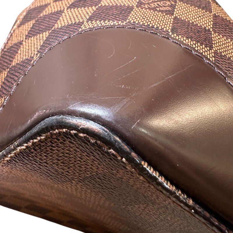 Louis Vuitton Hampstead Damier Ebene MM<br />
<br />
Date Code: Faded Entrupy Certficate Provided<br />
<br />
Dimensions:14 L X 11 H inches<br />
<br />
In very good condition. Some scratching on the hardware. Some minor fraying on the suede interior.<br />
<br />
Does not come with the original dust bag or box.