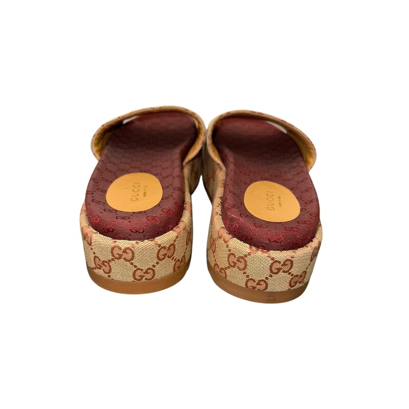 Gucci Angelina Platform Slides<br />
<br />
Size: 38<br />
<br />
Style Code:573018<br />
<br />
In very good condition. Some minor marks on the soles.<br />
<br />
Does not come with the original dust bag or box.