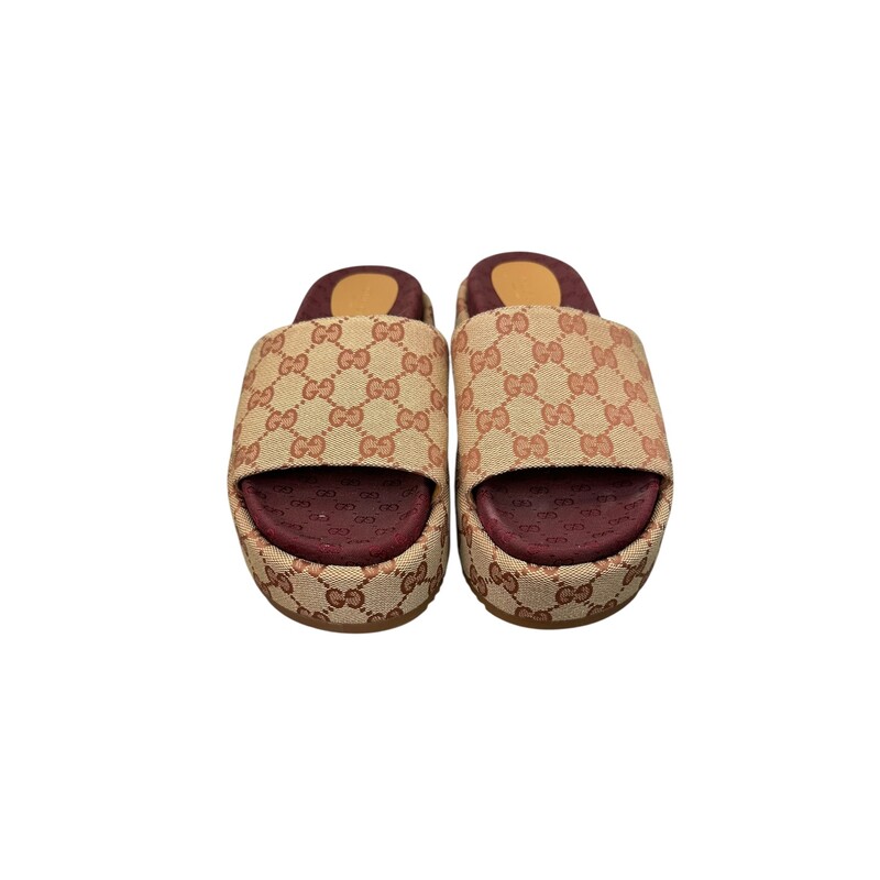 Gucci Angelina Platform Slides<br />
<br />
Size: 38<br />
<br />
Style Code:573018<br />
<br />
In very good condition. Some minor marks on the soles.<br />
<br />
Does not come with the original dust bag or box.