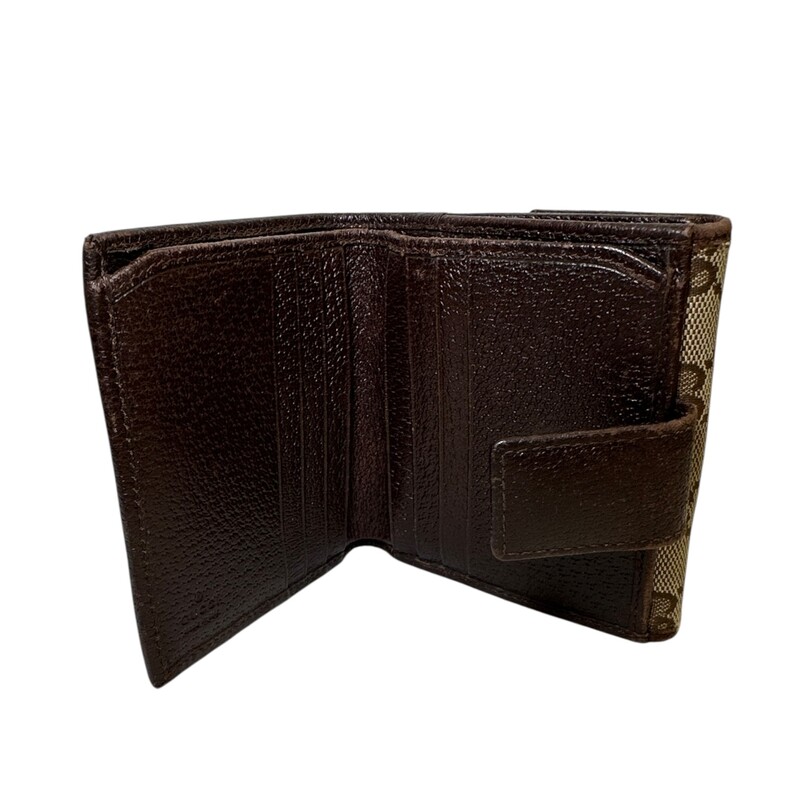 Gucci Metal French Monogram BiFold<br />
<br />
Date Code: 112716 1147<br />
<br />
Dimensions:<br />
Length: 4.25 in<br />
Height: 3.50 in<br />
Width: 1.00 in<br />
<br />
In good condition. Wear to the leather trims and scratching to the hardware.<br />
<br />
Does not come with the original dust bag or box.