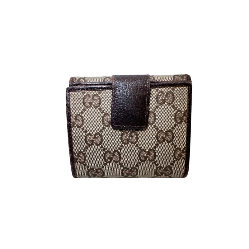 Gucci Metal French Monogram BiFold<br />
<br />
Date Code: 112716 1147<br />
<br />
Dimensions:<br />
Length: 4.25 in<br />
Height: 3.50 in<br />
Width: 1.00 in<br />
<br />
In good condition. Wear to the leather trims and scratching to the hardware.<br />
<br />
Does not come with the original dust bag or box.