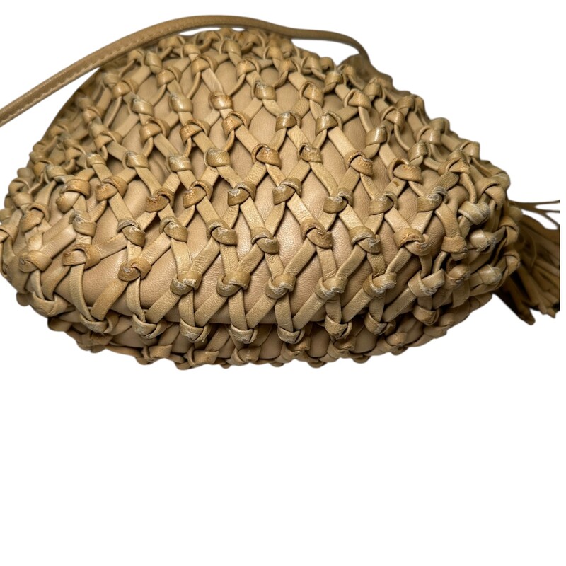 Chanel Woven Leather Tassle Bucket Bag<br />
<br />
Dimensions: 9 L x 9 H inches<br />
<br />
In very good condition. Some minor scuffing of the leather.  Some interior pen marks.<br />
<br />
Does not come with the original dust bag or box.