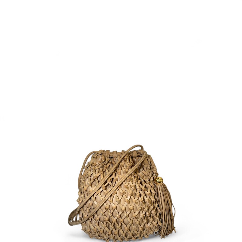 Chanel Woven Leather Tassle Bucket Bag

Dimensions: 9 L x 9 H inches

In very good condition. Some minor scuffing of the leather.  Some interior pen marks.

Does not come with the original dust bag or box.