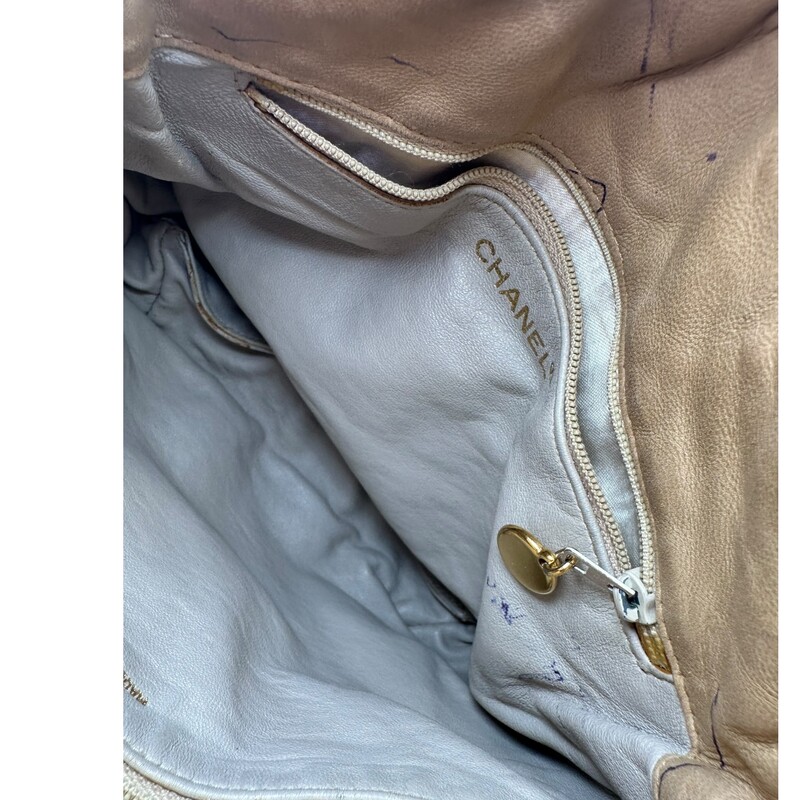 Chanel Woven Leather Tassle Bucket Bag<br />
<br />
Dimensions: 9 L x 9 H inches<br />
<br />
In very good condition. Some minor scuffing of the leather.  Some interior pen marks.<br />
<br />
Does not come with the original dust bag or box.