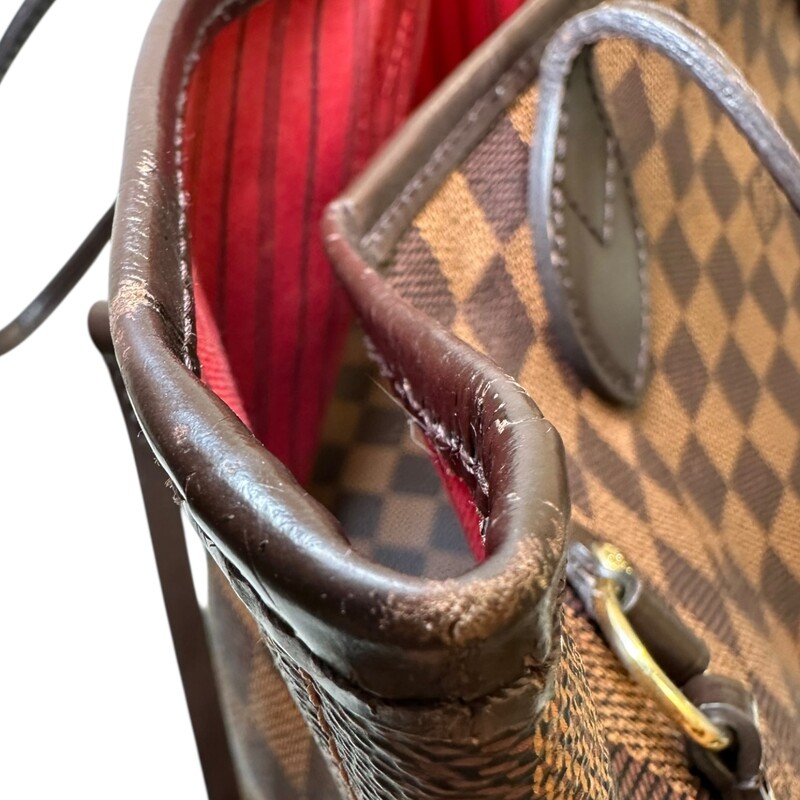 Louis Vuitton Neverfull MM Ebene<br />
<br />
Date Code: SD0196<br />
<br />
Dimenisons:<br />
12.2 x 11 x 5.5 inches<br />
(Length x Height x Width)<br />
<br />
In very good condition. Wear to the handles, creasing on the handles by the trim on all handles from storage.<br />
Comes with the wristlet pochette.<br />
<br />
Comes with the original dust bag. No box.