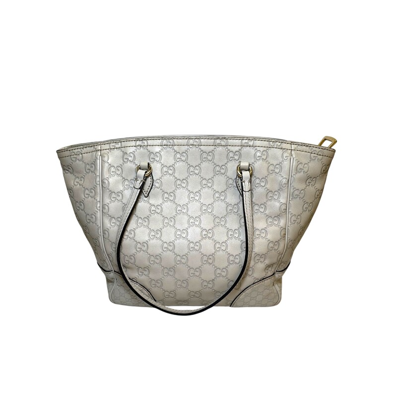 Gucci Bree Tote Small Cream Leather<br />
<br />
Style Code: 353119 520981<br />
<br />
Dimensions:<br />
Base length: 9.00 in<br />
Height: 9.00 in<br />
Width: 4.50 in<br />
Drop: 6.75 in<br />
<br />
In very good condition. Light wear to the corners and interior stain shown in photo.<br />
<br />
Does not come with the original dust bag or box.