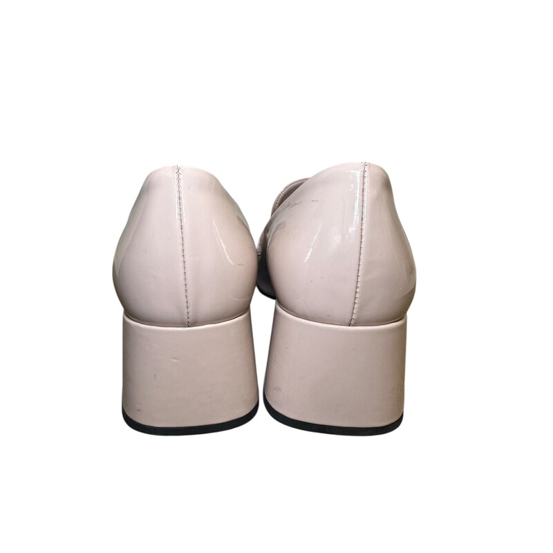 Prada Logo Loafer Patent Beige<br />
<br />
Size: 38.5<br />
<br />
In good condition. Creasing by the toes. Pink mark on left shoe and scuffing throughout the shoes.<br />
<br />
Does not come with the original dust bag or box.