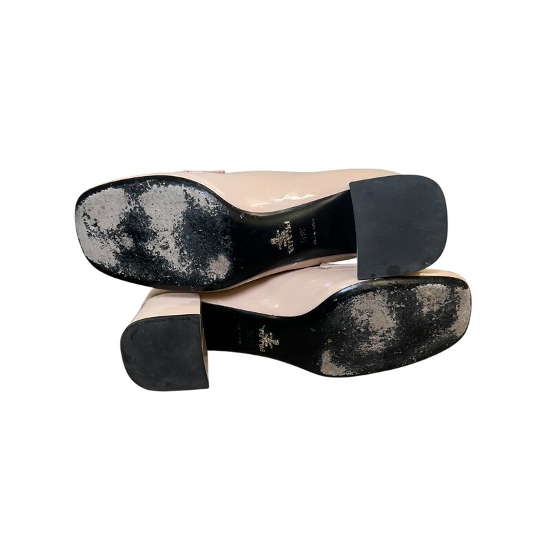 Prada Logo Loafer Patent Beige<br />
<br />
Size: 38.5<br />
<br />
In good condition. Creasing by the toes. Pink mark on left shoe and scuffing throughout the shoes.<br />
<br />
Does not come with the original dust bag or box.