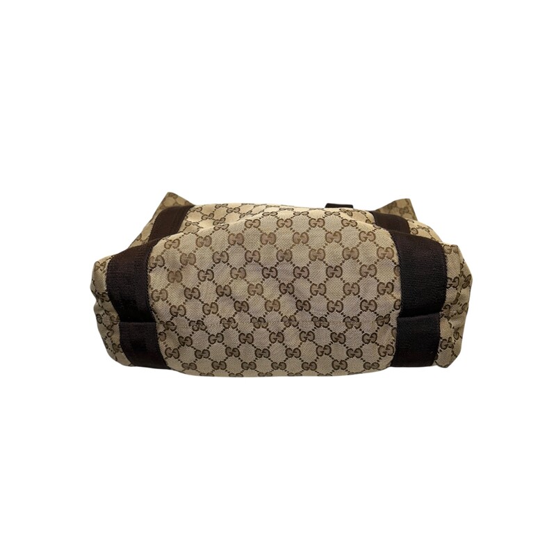 Gucci Vertical Canvas Tote Monogram<br />
<br />
Code: 189669 467891<br />
<br />
Dimensions:<br />
Base length: 10.25 in<br />
Height: 14 in<br />
Width: 6.5 in<br />
Drop: 5<br />
<br />
In ver good condition. Light wear to the bag.<br />
<br />
Does not come with the original dust bag or box.