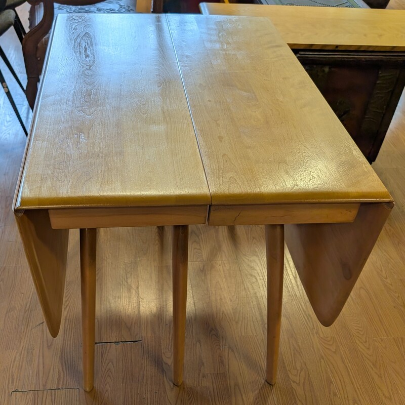 Heywood Wakefield Vintage Dining Table<br />
26w x 40d x 28.5h<br />
Dropleaves 16in<br />
2 Leaves 18in