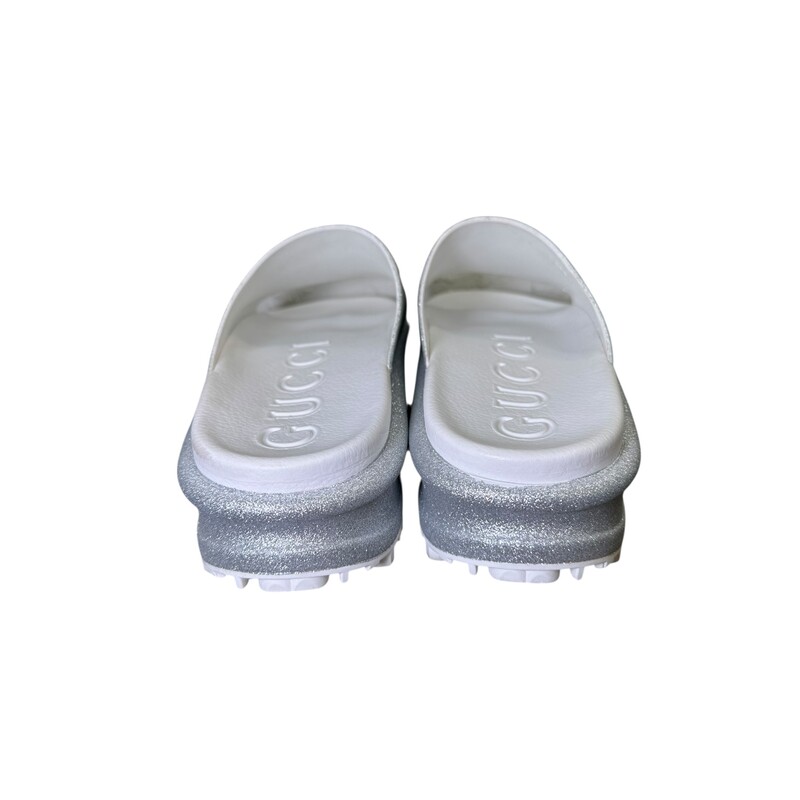 Gucci Miami Glitter Silver Slides<br />
<br />
Size: 41<br />
<br />
Code: 725541<br />
<br />
In very good condition. Light wear to the shoes.<br />
<br />
Comes with the original box.