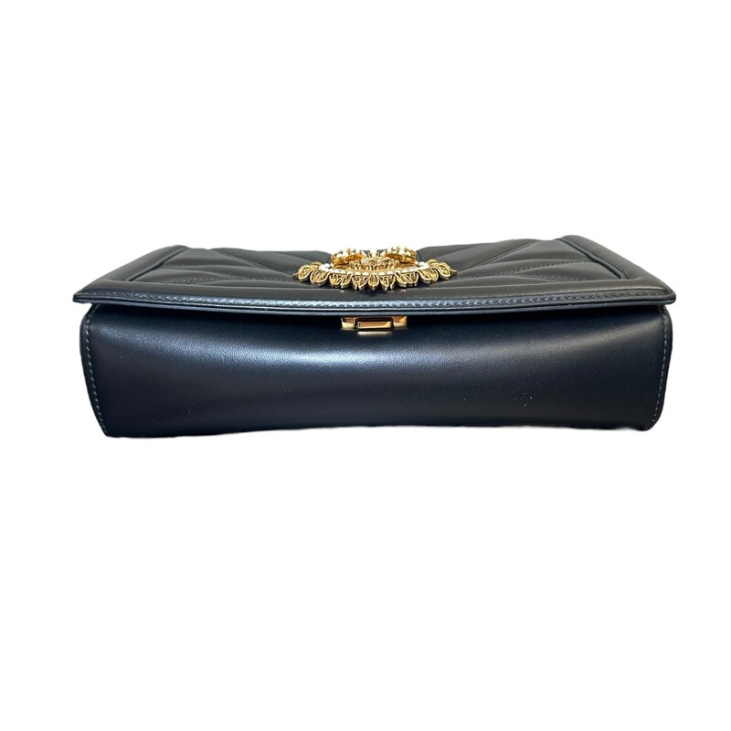 Dolce & Gabbana Devotion Lambskin Crossbody<br />
<br />
Dimensions:5.7H x 8.3 W x 1.2 D inches<br />
<br />
In excellent condition. Very faint scratching on the hardware.<br />
<br />
Comes with the original dust bag and box.