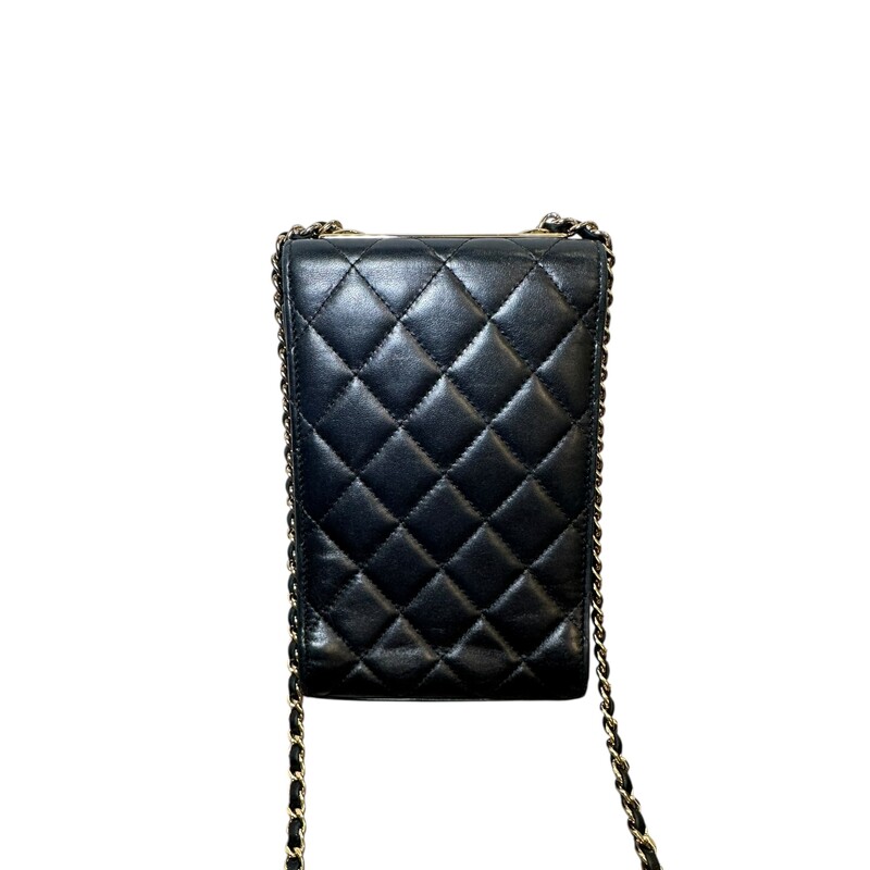 Chanel Trendy Lambskin Phone Holder<br />
<br />
Serial Code:24477884<br />
<br />
Dimensions:4.5 L x 7 H inches<br />
<br />
In very good condition. Some surface sctraches on the leather and hardware.<br />
<br />
Does not come with the original dust bag or box.