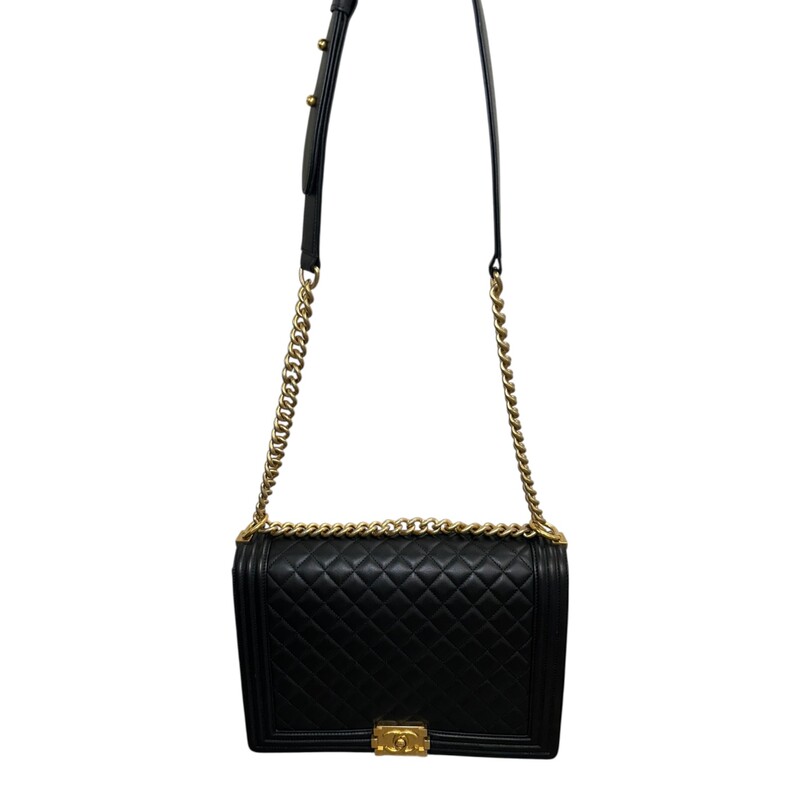 Chanel Black Boy Quilted Chain Large Bag<br />
<br />
Serial Code:20516849<br />
<br />
Dimensions: 12 L x 9 H inches<br />
<br />
In excellent condition.Some faint marks on the hardware. Very minor corner wear.<br />
<br />
Comes with the original dust bag and box.
