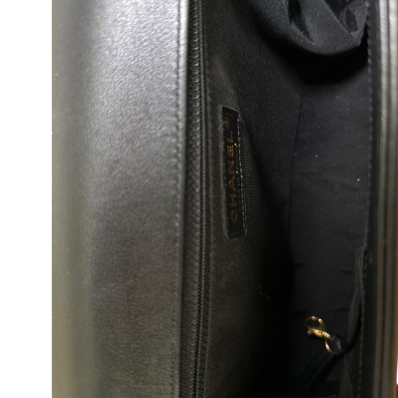 Chanel Black Boy Quilted Chain Large Bag<br />
<br />
Serial Code:20516849<br />
<br />
Dimensions: 12 L x 9 H inches<br />
<br />
In excellent condition.Some faint marks on the hardware. Very minor corner wear.<br />
<br />
Comes with the original dust bag and box.