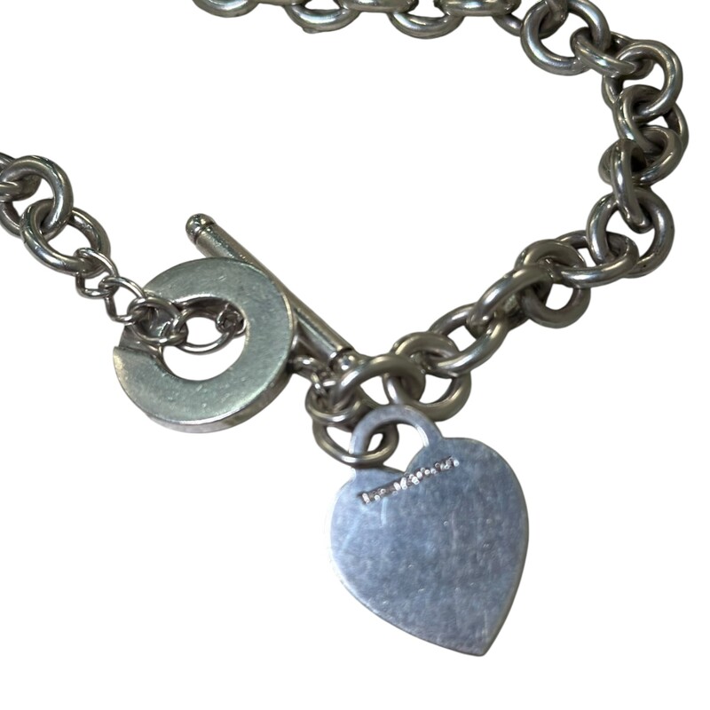Tiffany & Co Heart Please Return to Tiffany Bracelet<br />
<br />
.925 Sterling Silver<br />
<br />
Dimensions:Chain Length: 7inches<br />
<br />
In very good condition. Some surface scratches.<br />
<br />
Comes with the orginal dust bag. No box.
