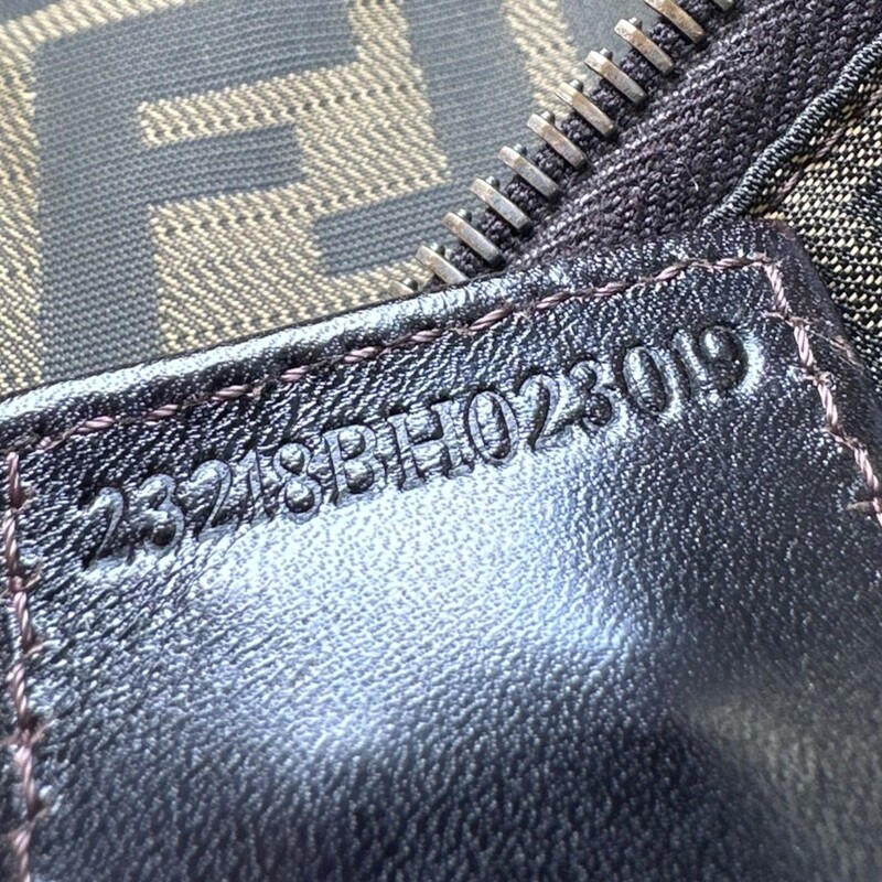 Fendi Zucca Monogram Nylon Tote<br />
<br />
Serial Code:2318BH023019<br />
<br />
Dimensions:13 L x 9 H inches<br />
<br />
In very good condition. Minor kink on the strap.<br />
<br />
Does not come with the original dust bag or box,