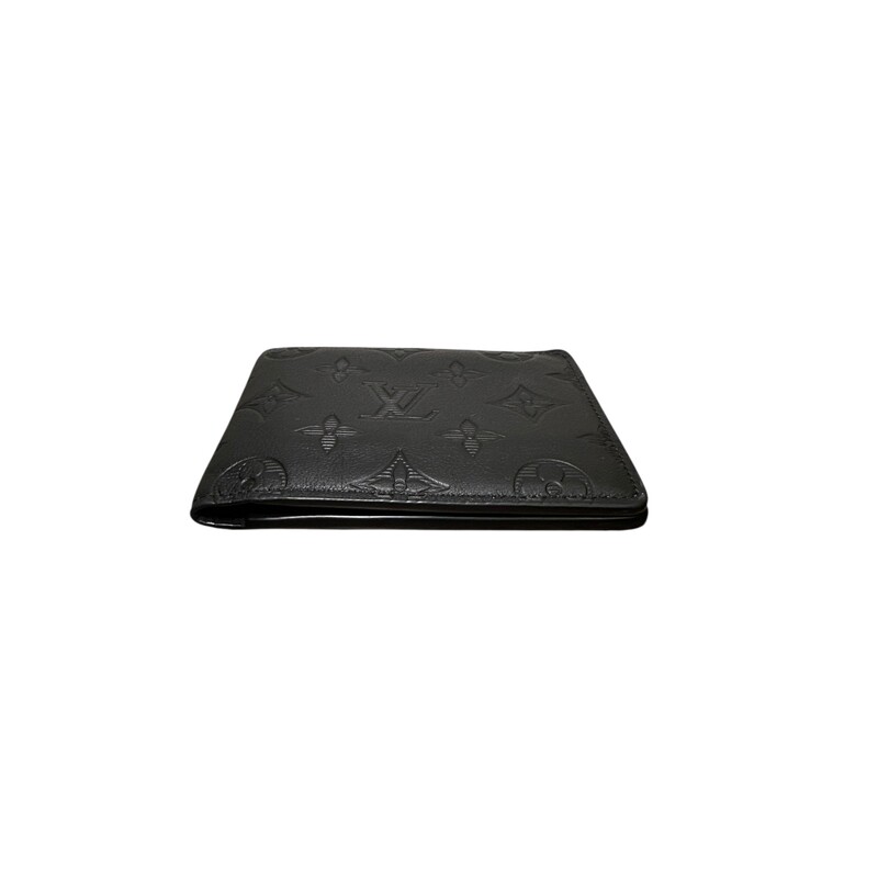 Louis Vuitton Shadow Multiple leather Wallet<br />
<br />
Date Code: Microchip<br />
<br />
Base length: 4.75 in<br />
<br />
Height: 3.5 in<br />
<br />
Width: 0.75 in<br />
<br />
In very good condition. Some creassing of the leather and corner flapping of the wallet<br />
<br />
Comes with the original dust bag and box.