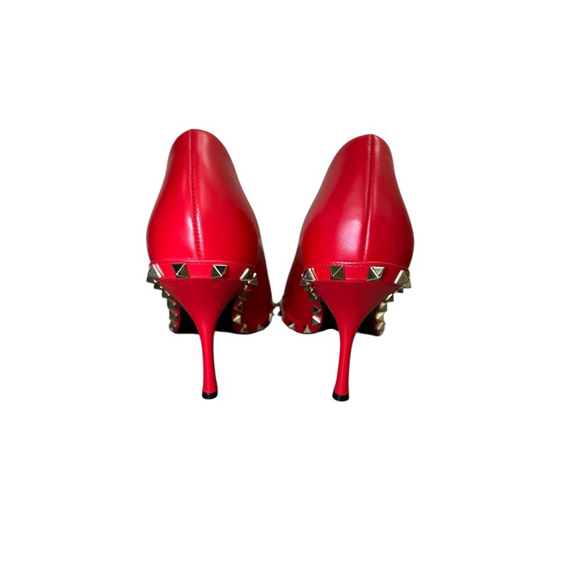 Valentino Rockstud Pumps Red Pointed Toe 100mm<br />
<br />
Size: 38<br />
<br />
Code: VSC HX80<br />
<br />
In very good condition. Light scuffs to the bottom sole and near the toes.<br />
<br />
Does not come with the original dust bag or box.