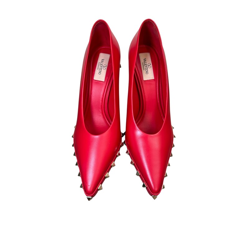 Valentino Rockstud Pumps Red Pointed Toe 100mm<br />
<br />
Size: 38<br />
<br />
Code: VSC HX80<br />
<br />
In very good condition. Light scuffs to the bottom sole and near the toes.<br />
<br />
Does not come with the original dust bag or box.