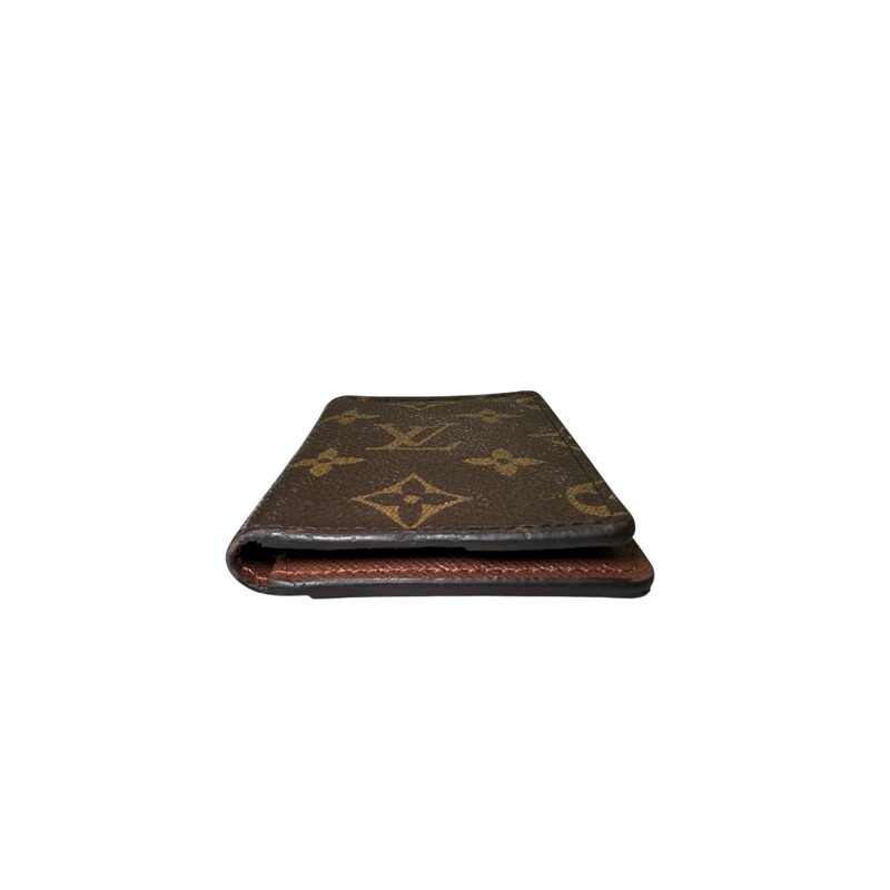 Louis Vuitton Monogram Pocket Organizer<br />
<br />
Date Code:MI4146<br />
<br />
Dimensions:5 L x 7 H inches<br />
<br />
In very good condition. Light marks inside the interior.<br />
<br />
Comes with the original dust bag and box.