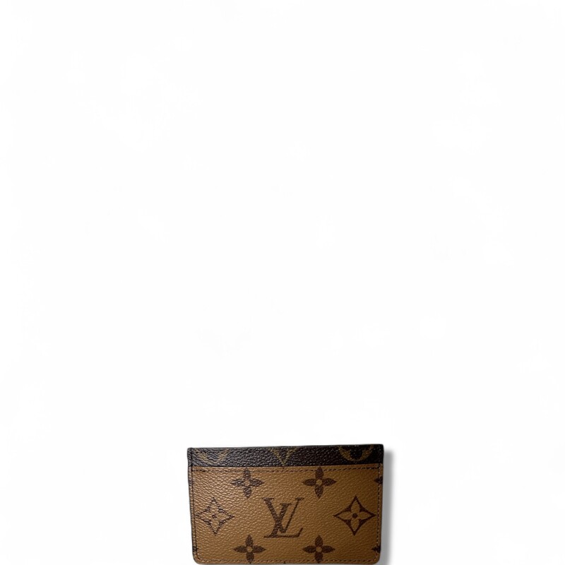 Louis Vuitton Reverse Card Holder

Date Code: Microchip

Dimensions: 4 L x 2.5 H inches

In excellent condition. Like new

Comes with the orginal dust bag and box.