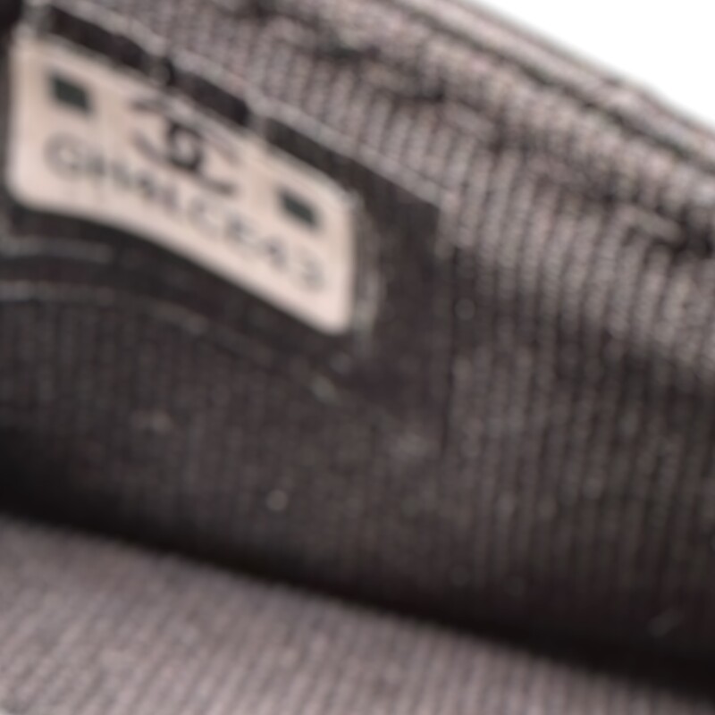 Chanel So Black Classic  Lambskin Flap Card<br />
<br />
Serial Code: GH4****<br />
<br />
In very good condition. Some minor scratches on the in the interior leather .<br />
<br />
Dimensions: 4.5 L X 3 H inches<br />
<br />
Does not come with the original dust bag or box.