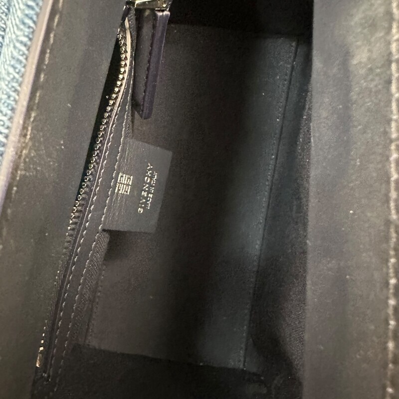 Givenchy Lock Antigona Mini Denim<br />
<br />
Code: KUH0225<br />
<br />
Dimensions:<br />
8.5W x 7.5H x 5D<br />
3 handle drop<br />
18-21 strap drop<br />
<br />
In very good condition. Light mark to the front of the handbag.<br />
<br />
Does not come with the original dust bag or box.