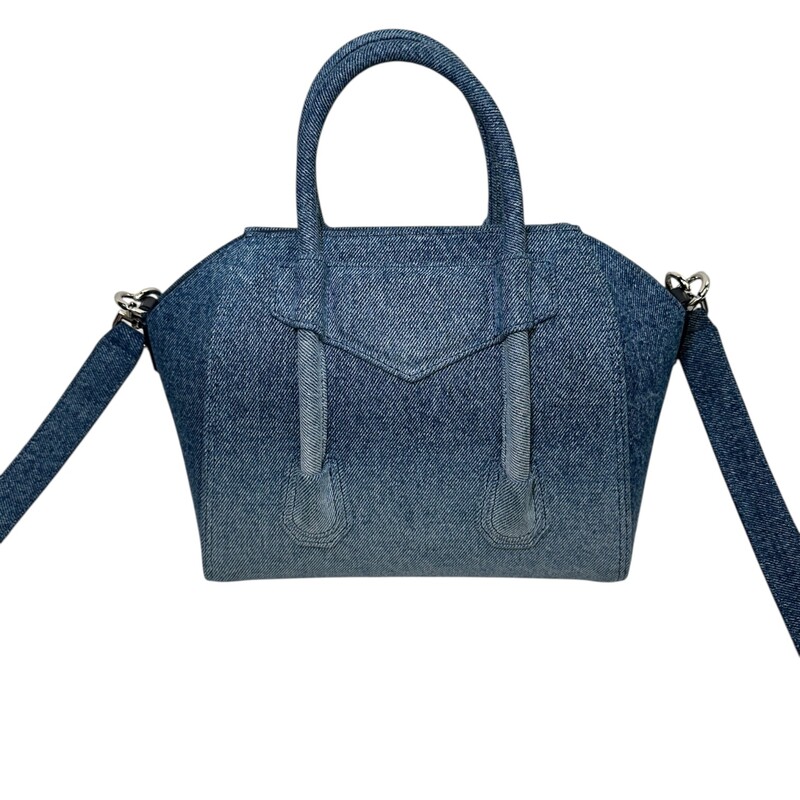 Givenchy Lock Antigona Mini Denim<br />
<br />
Code: KUH0225<br />
<br />
Dimensions:<br />
8.5W x 7.5H x 5D<br />
3 handle drop<br />
18-21 strap drop<br />
<br />
In very good condition. Light mark to the front of the handbag.<br />
<br />
Does not come with the original dust bag or box.