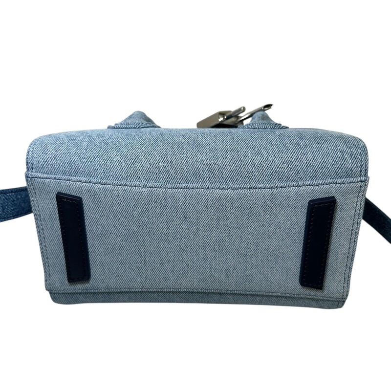 Givenchy Lock Antigona Mini Denim<br />
<br />
Code: KUH0225<br />
<br />
Dimensions:<br />
8.5W x 7.5H x 5D<br />
3 handle drop<br />
18-21 strap drop<br />
<br />
In very good condition. Light mark to the front of the handbag.<br />
<br />
Does not come with the original dust bag or box.