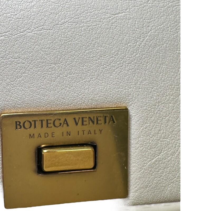 Bottega Veneta Desiree White Handbag Mini<br />
<br />
Code: P02783907X<br />
<br />
Dimensions:<br />
Base length: 7.50 in<br />
Height: 5.90 in<br />
Width: 2.60 in<br />
Drop: 18.90 in<br />
<br />
In very good condition. Light indentation to the leather.<br />
<br />
Comes with the original dust bag. No box.