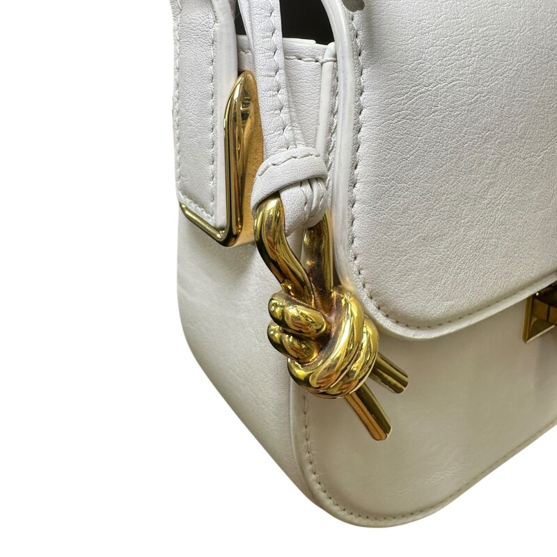 Bottega Veneta Desiree White Handbag Mini<br />
<br />
Code: P02783907X<br />
<br />
Dimensions:<br />
Base length: 7.50 in<br />
Height: 5.90 in<br />
Width: 2.60 in<br />
Drop: 18.90 in<br />
<br />
In very good condition. Light indentation to the leather.<br />
<br />
Comes with the original dust bag. No box.