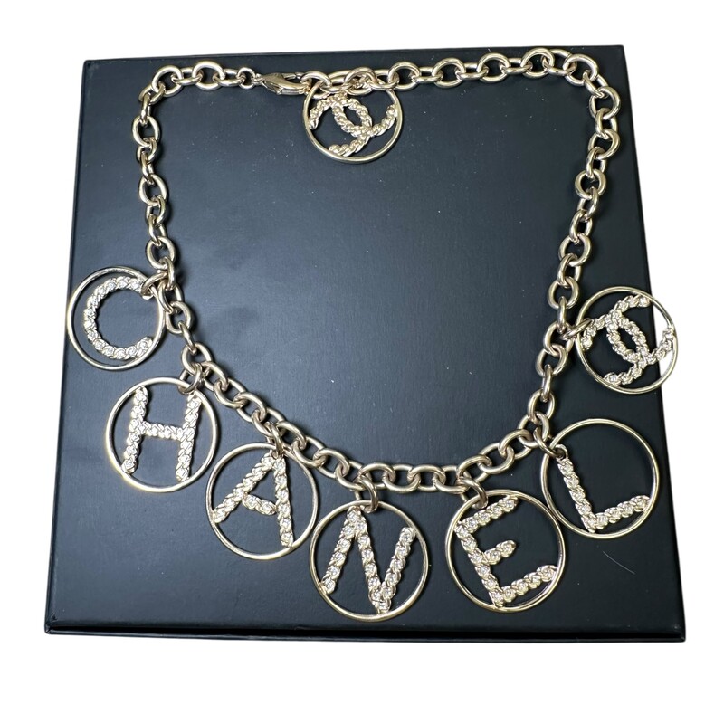 Chanel Crystal Logo Metal Strass Necklace<br />
<br />
B19 P<br />
<br />
In excellent condition.<br />
<br />
Comes with the original dust cover and box.