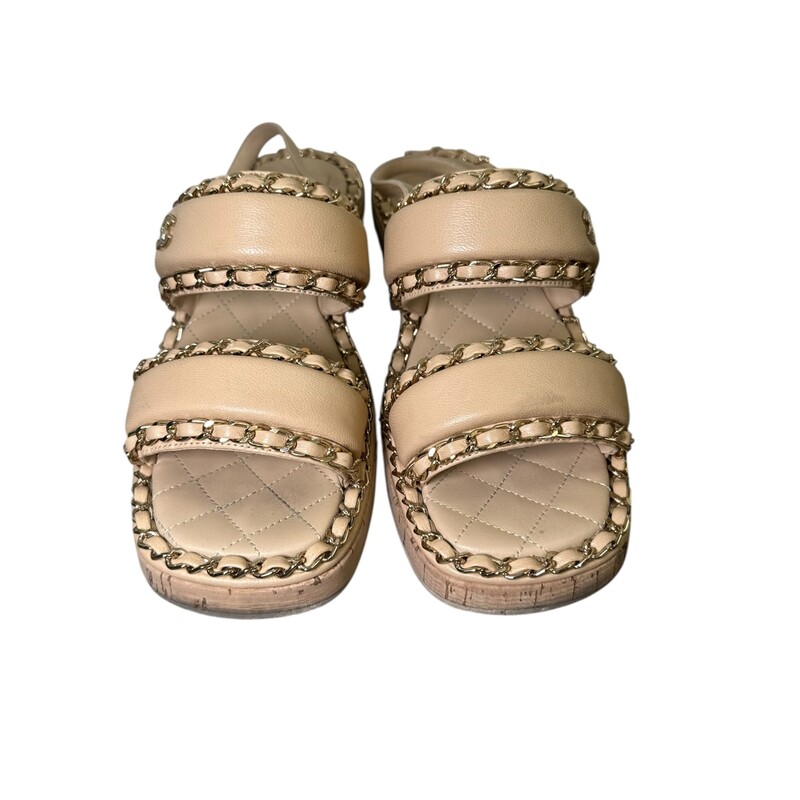 Chanel Interlocking CC Slingback Beige Sandals<br />
<br />
Size: 35<br />
<br />
Code: G38489<br />
<br />
In very good condition. Light scuffs on the cork and throughout the shoes.<br />
<br />
Does not come with the original dust bag or box.