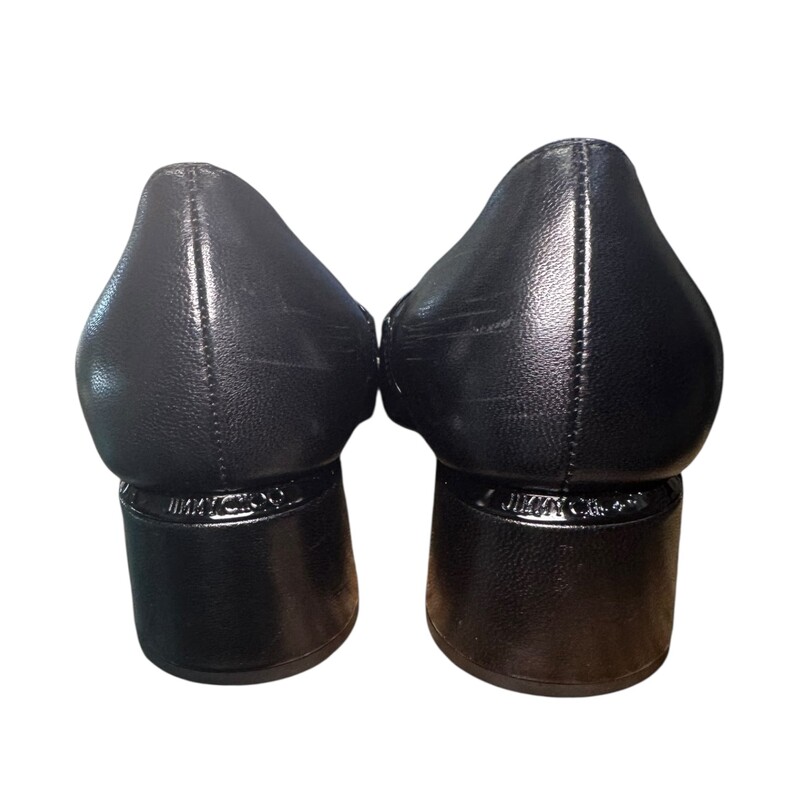 Jimmy Choo Elisa 45 Black Shoes<br />
<br />
Size: 37<br />
<br />
In very good condition. Light stuffs throughout the shoes.<br />
<br />
Does not come with the original dust bag or box.