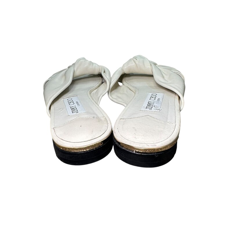 Jimmy Choo Nappa Leather White Sandals

Size 37

In good condition. Wear to the front leather toe and throughout the shoe. Mark on bottom of shoes.

Does not come with the original dust bag or box.