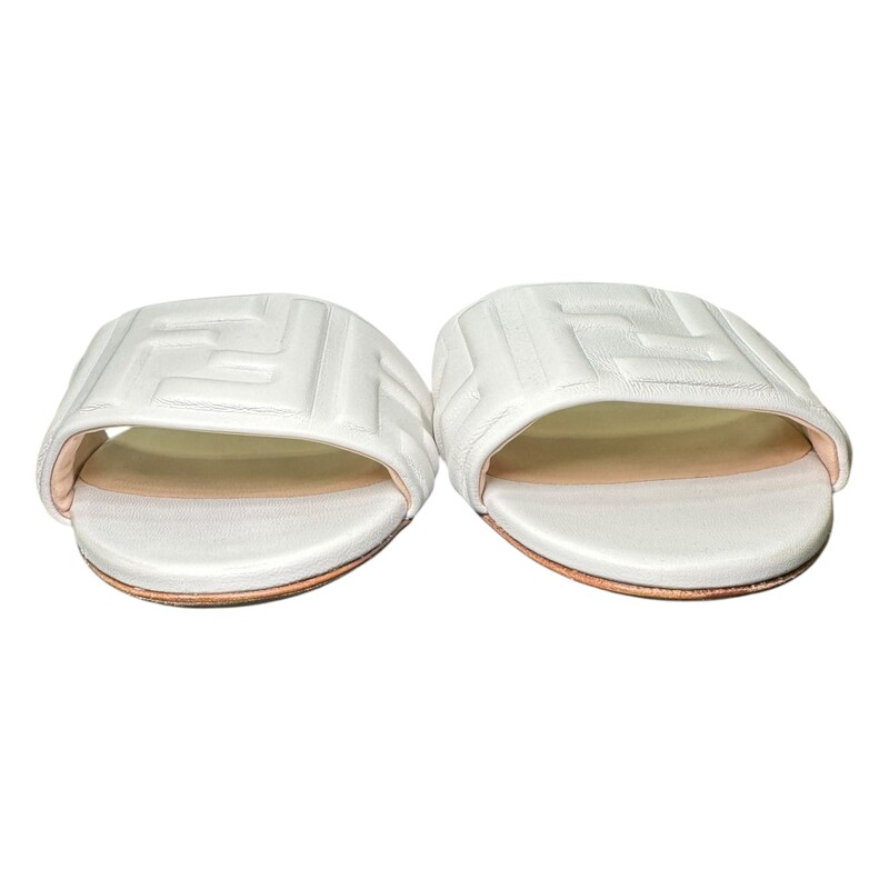 Fendi FF Embossed Mules White Leather<br />
<br />
Size: 39<br />
<br />
In excellent condition.<br />
<br />
Comes with the original dust bag and box.