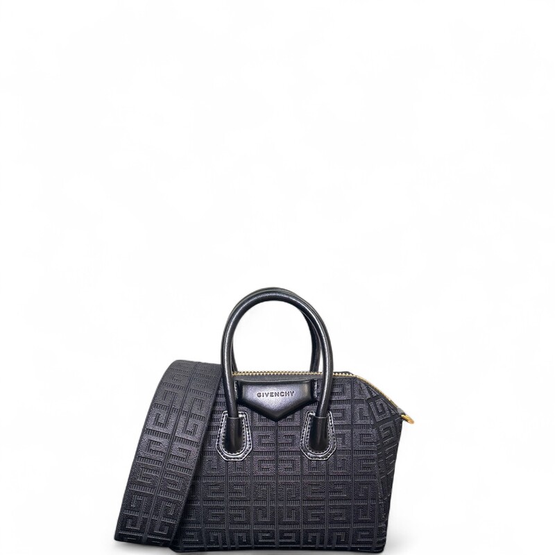 Givenchy Mini Antigona Top Handle Bag In 4G Embroidered Canvas

Code: MP B1221

Dimensions:
10.2 in x 7.5 in x 5.1 in

In very good condition. Light wear to the interior.

Comes with the original dust bag. No box.
