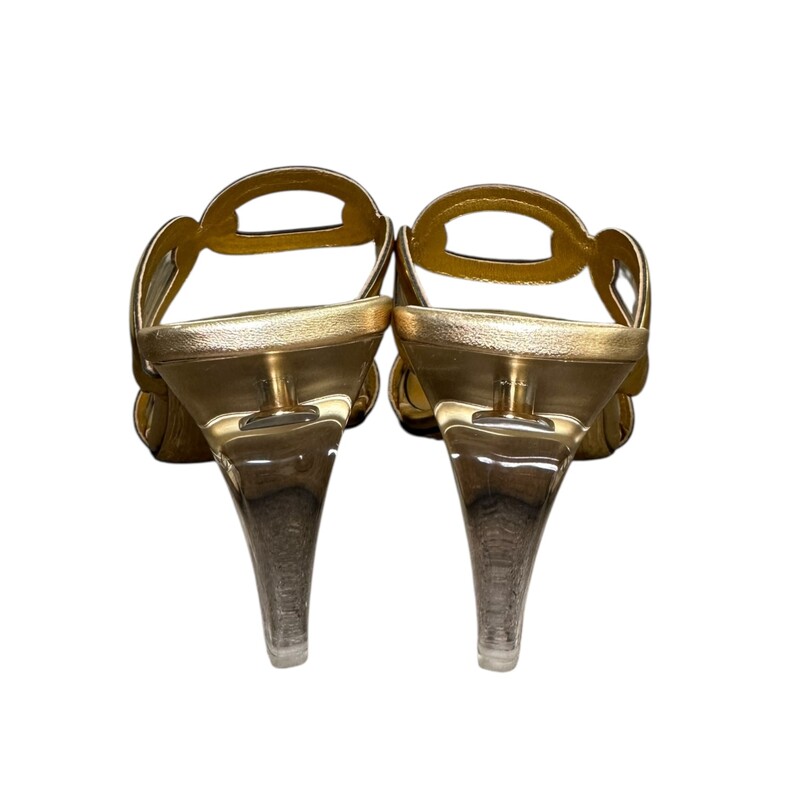 100mm Chain 1967 sandal heels

Gold

Size 36

In very good condtion. Some scuffs on sole.

Does not come with the original dust bag or box.