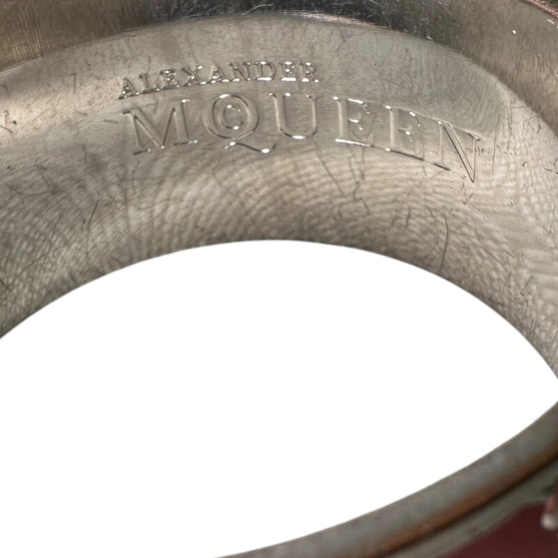 Alexander Mcqueen Skull Enamel Orange & Red Cuff<br />
<br />
In very good condition. Some scratching throughout.<br />
<br />
Does not come with the original dust bag or box.