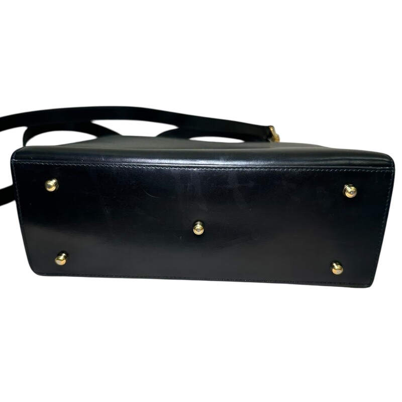 Gucci Lady Lock Top Handle Black Handbag<br />
<br />
Code:<br />
260258<br />
<br />
Dimensions:<br />
9.4in W x 7.9in x 3.5inD<br />
<br />
In very good vintage condition. Light marks in the interior and throughout the bag.<br />
<br />
Does not come with the original dust bag or box.