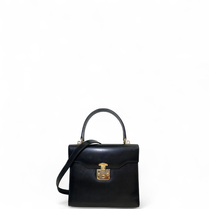 Gucci Lady Lock Top Handle Black Handbag

Code:
260258

Dimensions:
9.4in W x 7.9in x 3.5inD

In very good vintage condition. Light marks in the interior and throughotu the bag.

Does not come with the original dust bag or box.