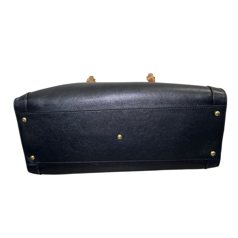 Gucci Diana Leather Tote Medium Black Tote<br />
<br />
Code: 655658 525040<br />
<br />
Dimensions:<br />
Length: 13.75 in<br />
Width: 5.25 in<br />
Height: 11.25 in<br />
Drop: 4 in<br />
Drop: 17 in<br />
Drop: 21 in<br />
<br />
In very good condition. Light wear to the trim and to the leather. Some coner wear.<br />
<br />
Comes with the original dust bag. No box.